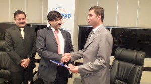 Chairman ERRA Mr. Hamid Yar Hiraj shaking hands with Mr. Sinan Yildiz, Deputy Director General of AFAD after signing a Letter of Intent at to build education facility for Van quake victims, Ankara, 15 October 2012